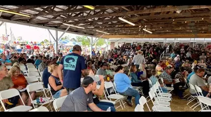 Kids sell livestock during UP State Fair Junior Market Livestock Auction