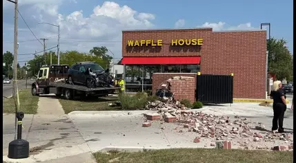 1 injured after car crashes into part of Waffle House