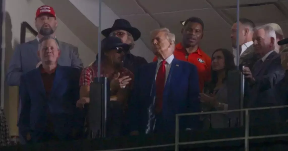 Watch Donald Trump, flanked by Kid Rock and John Daly, play to Alabama fans with concessions