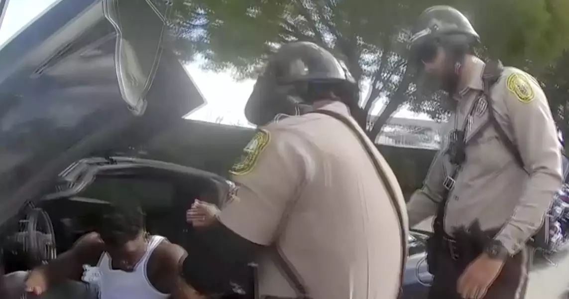 Bodycam shows Miami officer drag Dolphins star Tyreek Hill out of car during traffic stop