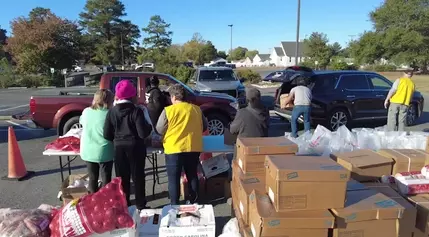 People’s Community Alliance holds one-stop shop with free food distribution