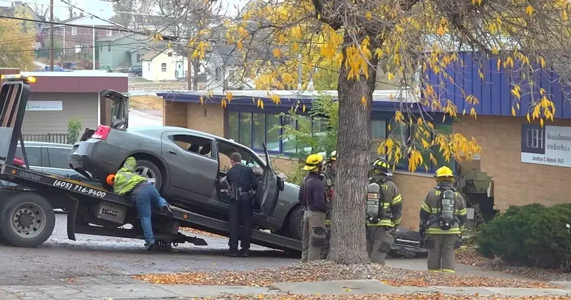 Rapid City Crash Leaves Building Damaged, Driver Arrested