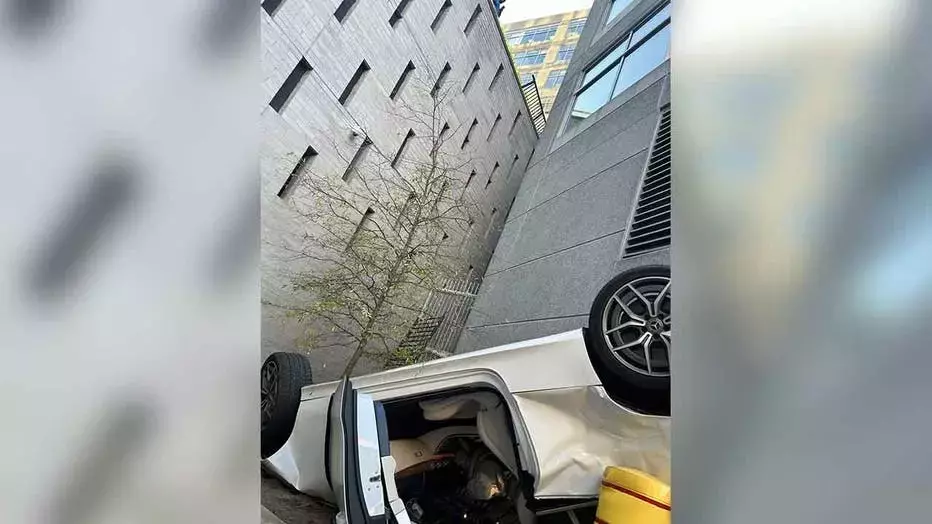 Dramatic Plunge: Car Crashes Through Parking Garage Barrier, Plummeting Five Floors