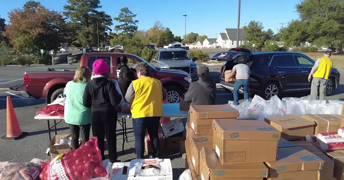 People’s Community Alliance holds one-stop shop with free food distribution