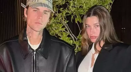 Justin Bieber Kisses Wife Hailey in Cryptic Photos of Him Teasing a Potential Music Comeback