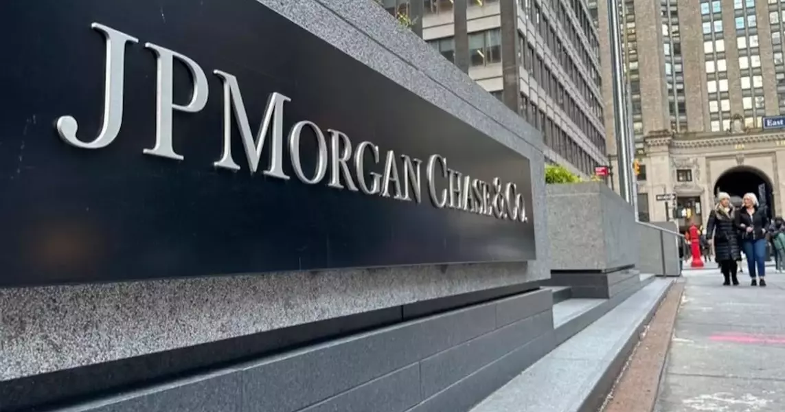 JPMorgan net income falls as bank sets aside more money to cover potential bad loans