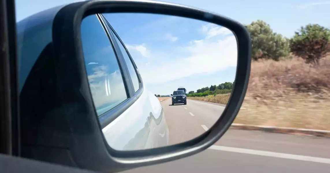 Unraveling the Mysteries of Side-View Mirrors: A Deeper Dive into the Science and Safety Implications