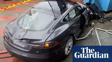 Tesla Crashes into 3 Cars, Drives off Sydney Shopping Centre Rooftop