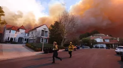 Flames Force Evacuations in Celebrity-Filled Pacific Palisades