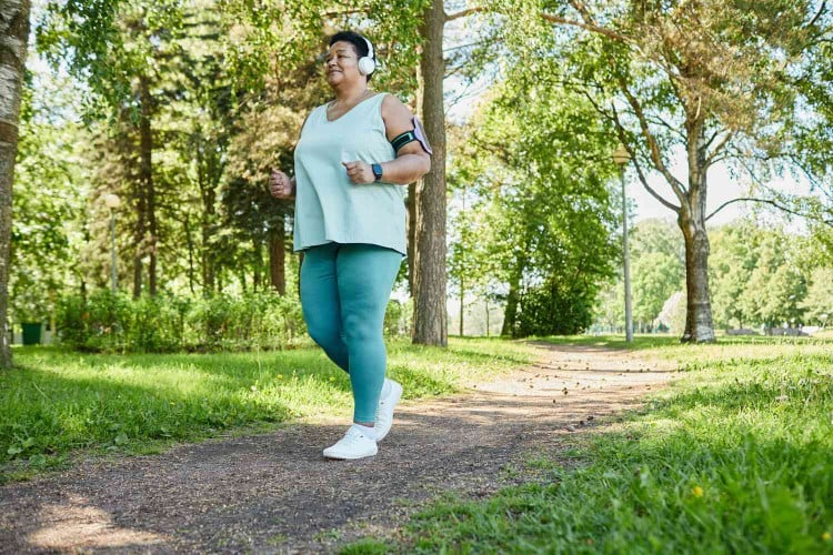 woman walking in park